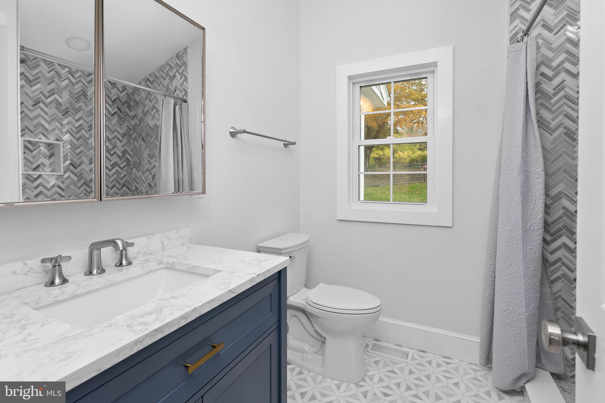 36 Chest-Georgetown Road Columbus, NJ 08022 - Photo 31 of 60 a bathroom with a granite countertop sink toilet and shower