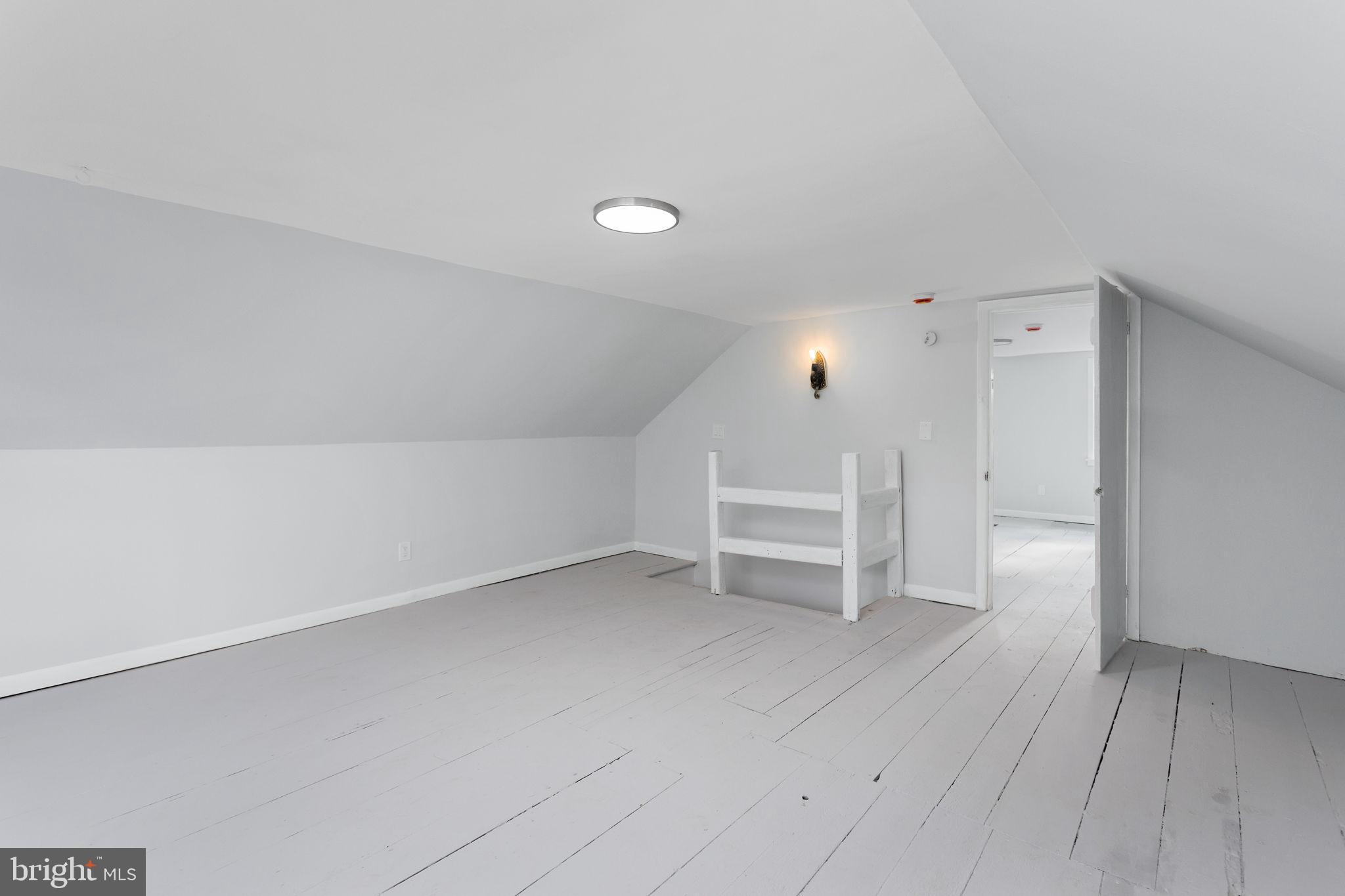 36 Chest-Georgetown Road Columbus, NJ 08022 - Photo 46 of 60 a view of an empty room with wooden floor and a window