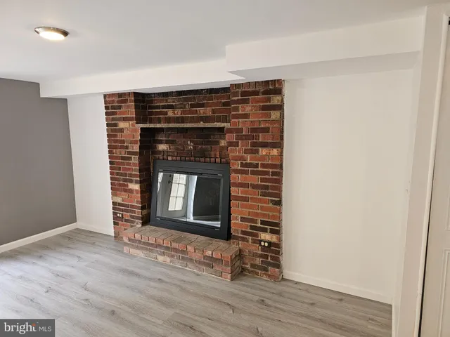 a view of kitchen with wooden floor