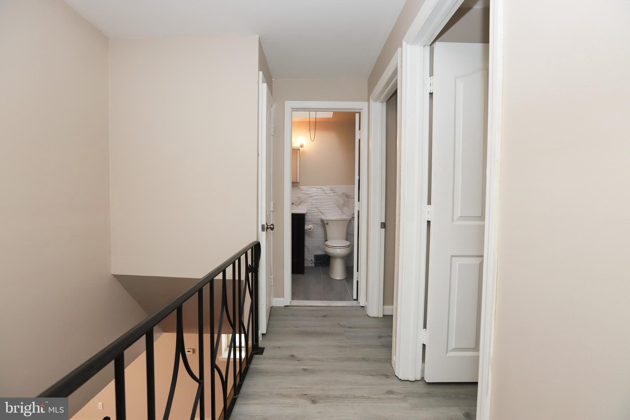 3559 Churchill Lane Philadelphia, PA 19114 - Photo 14 of 30 a view of a hallway with wooden floor and entryway