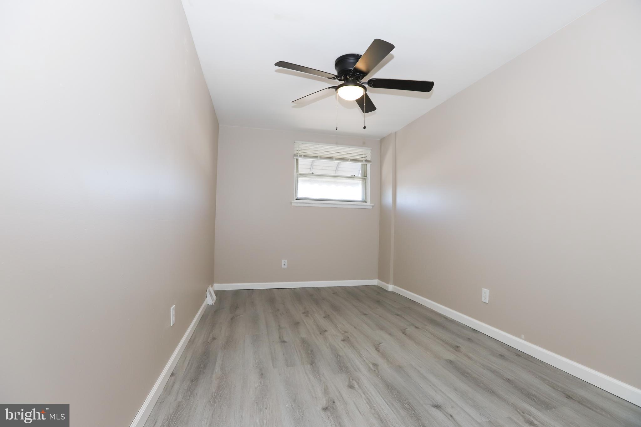 3559 Churchill Lane Philadelphia, PA 19114 - Photo 19 of 30 a view of a room with wooden floor closet and windows
