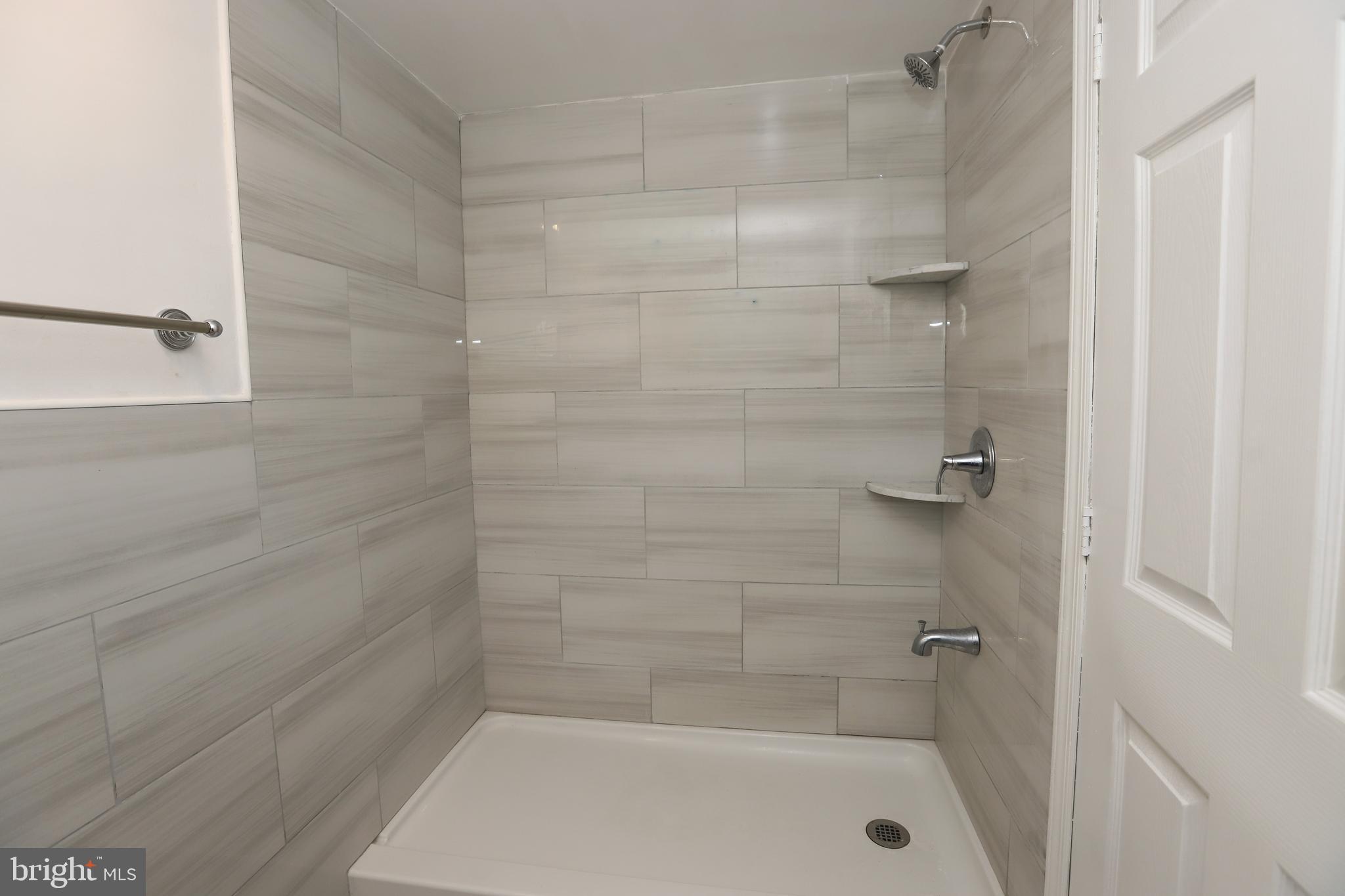 3559 Churchill Lane Philadelphia, PA 19114 - Photo 26 of 30 a bathroom with a shower