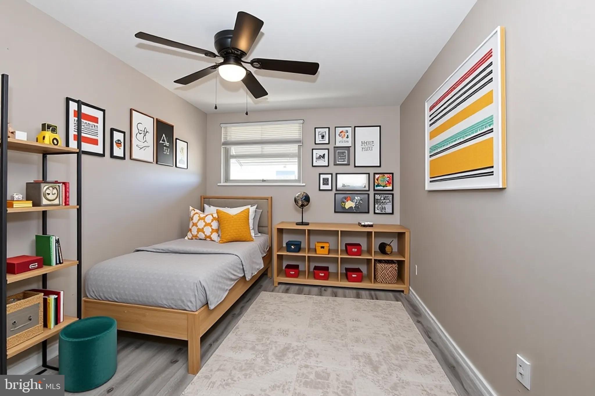 3559 Churchill Lane Philadelphia, PA 19114 - Photo 29 of 30 a bedroom with bed and a chandelier