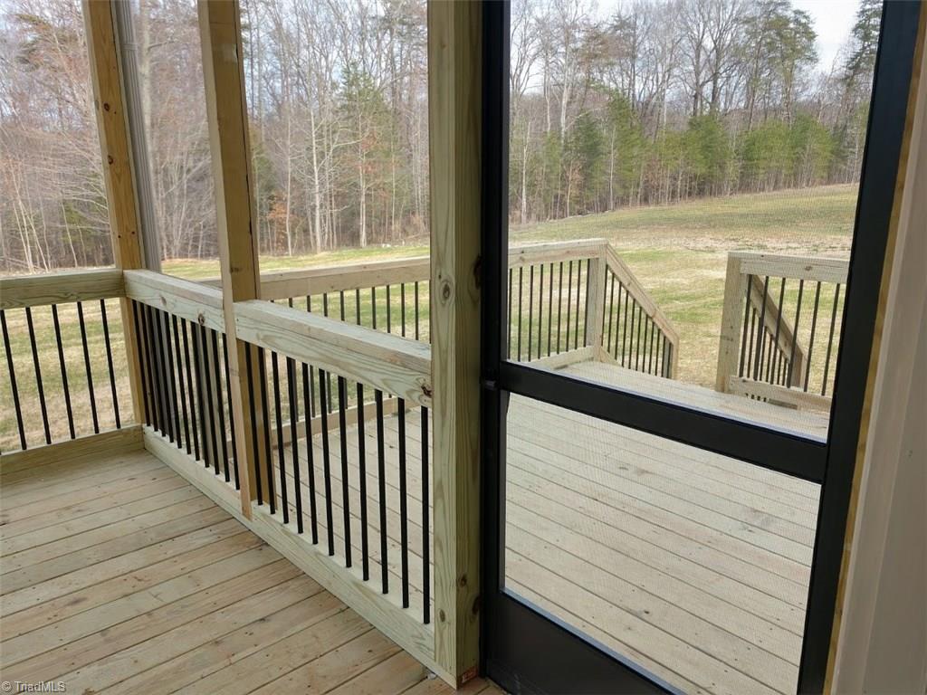 5517 Rambling Road Greensboro, NC 27409 - Photo 25 of 27 Screen Porch with deck.