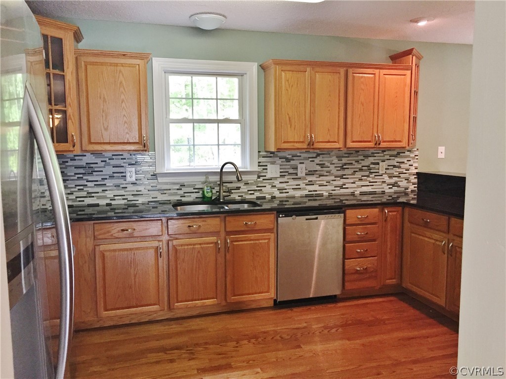 7212 Swiftrock Ridge Terrace Chesterfield, VA 23838 - Photo 3 of 17 Great kitchen with granite and back splash that ov