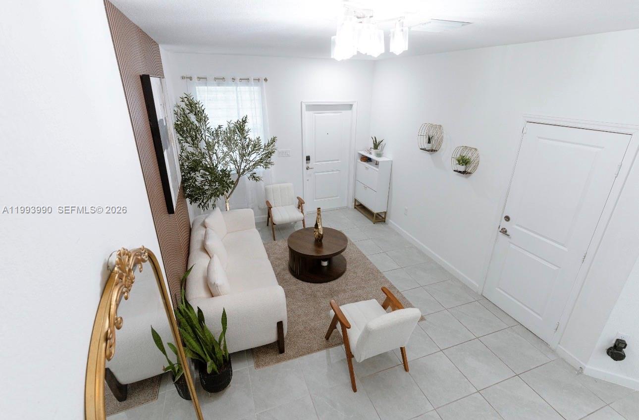 16222 Southwest 290th Terrace, Unit 16222 Homestead, FL 33033 - Photo 30 of 38 a bathroom with sink and mirror