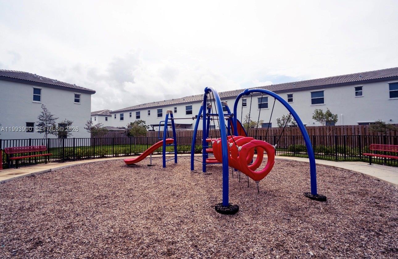 16222 Southwest 290th Terrace, Unit 16222 Homestead, FL 33033 - Photo 36 of 38 a view of outdoor space with garden and entertaining space