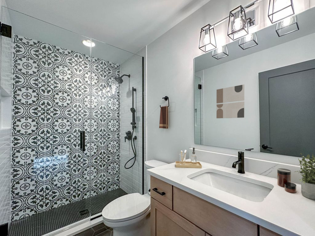 5S504 Radcliff Road Naperville, IL 60563 - Photo 16 of 23 a bathroom with a sink toilet and shower