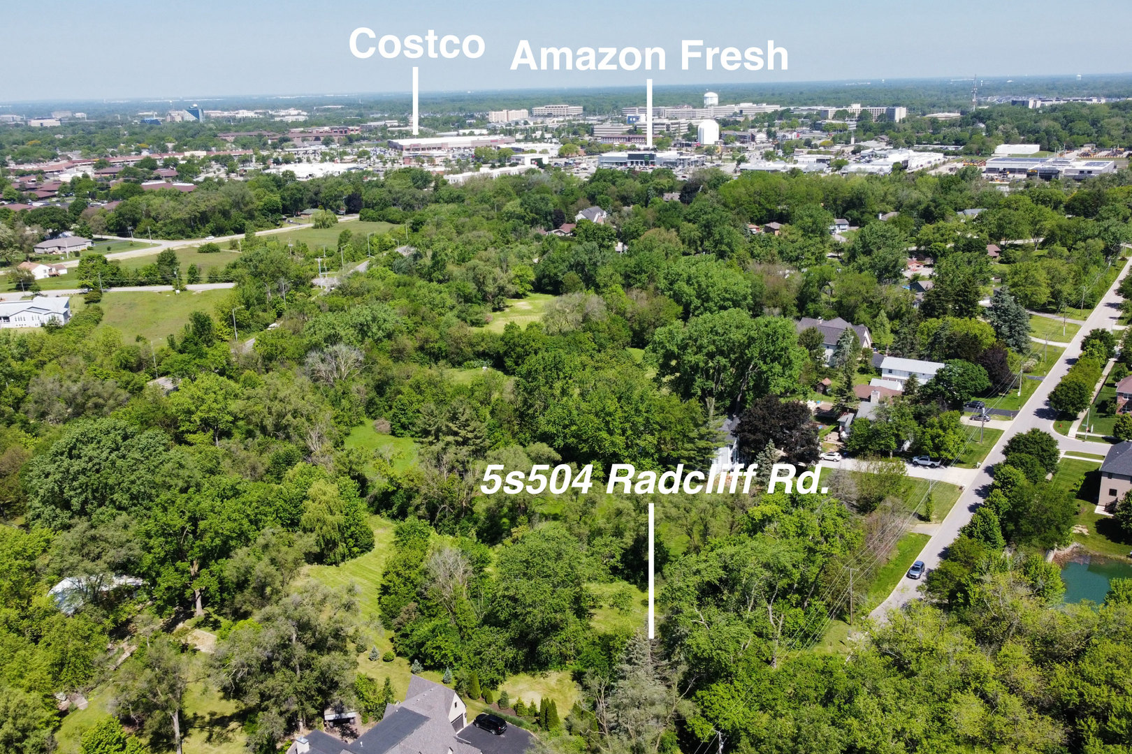 5S504 Radcliff Road Naperville, IL 60563 - Photo 21 of 23 a view of a bunch of trees and houses