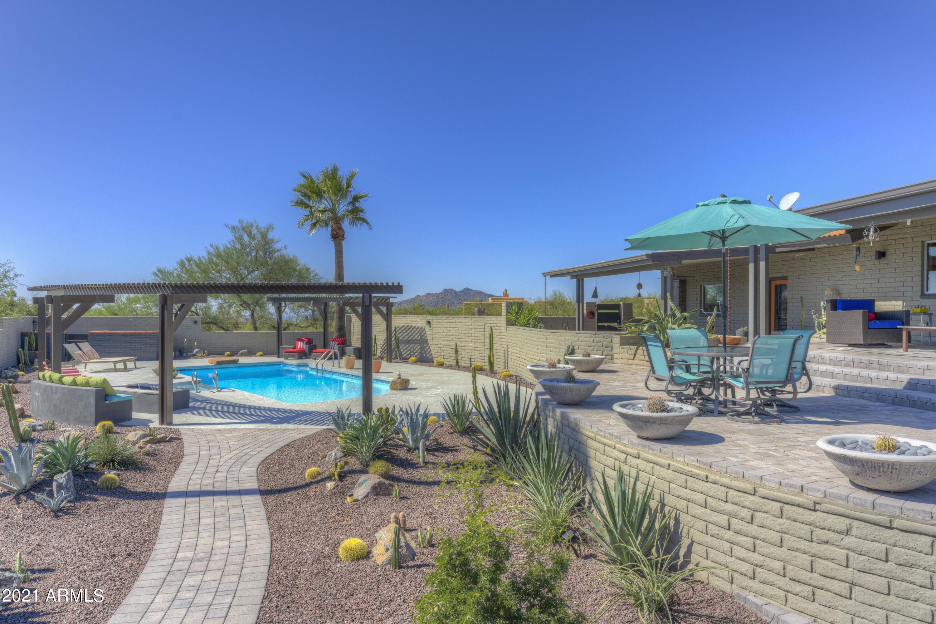 9535 Romping Road Carefree, AZ 85377 - Photo 49 of 61 Firepit at poolside