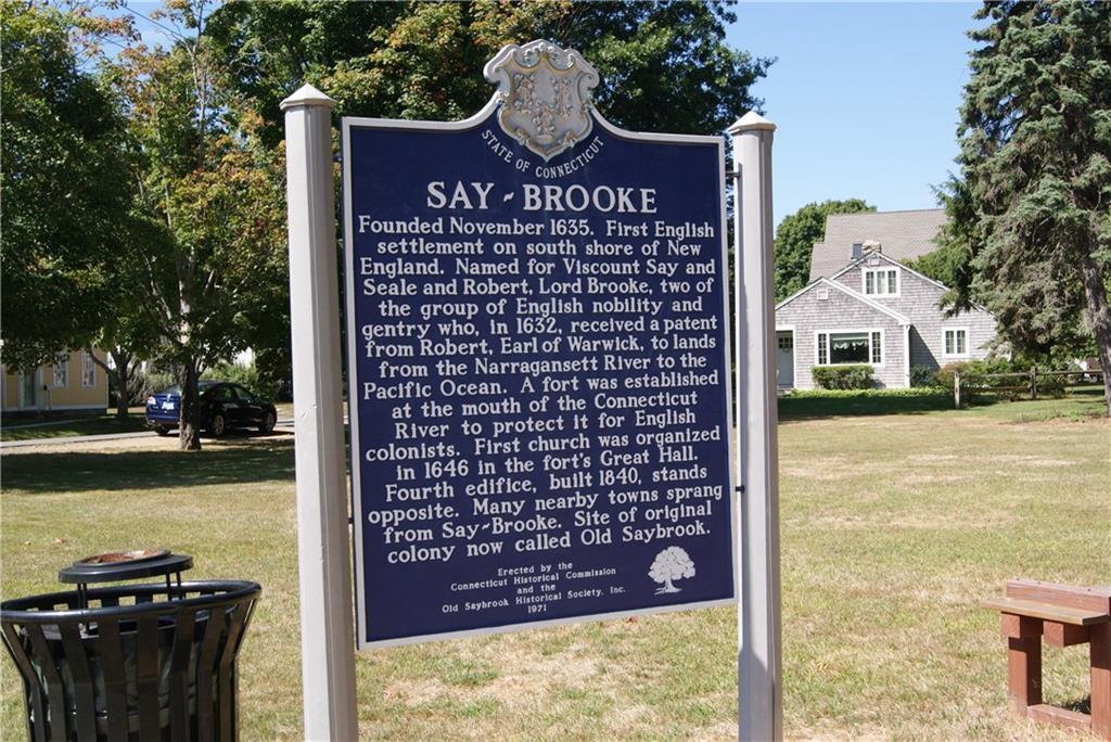 0 School House Road Old Saybrook, CT 06475 - Photo 1 of 1 a front view of a building with lake view and a yard