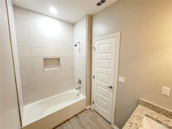 a bathroom with a bathtub