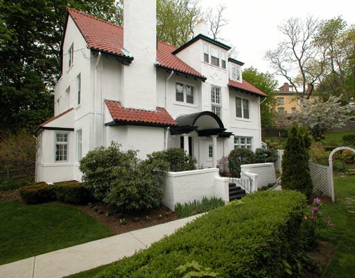 45 Waban Hill Road Newton, MA 02467 - Photo 1 of 4 a view of a white house with a yard plants and large tree
