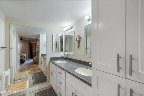 a view of a patio in a backyard