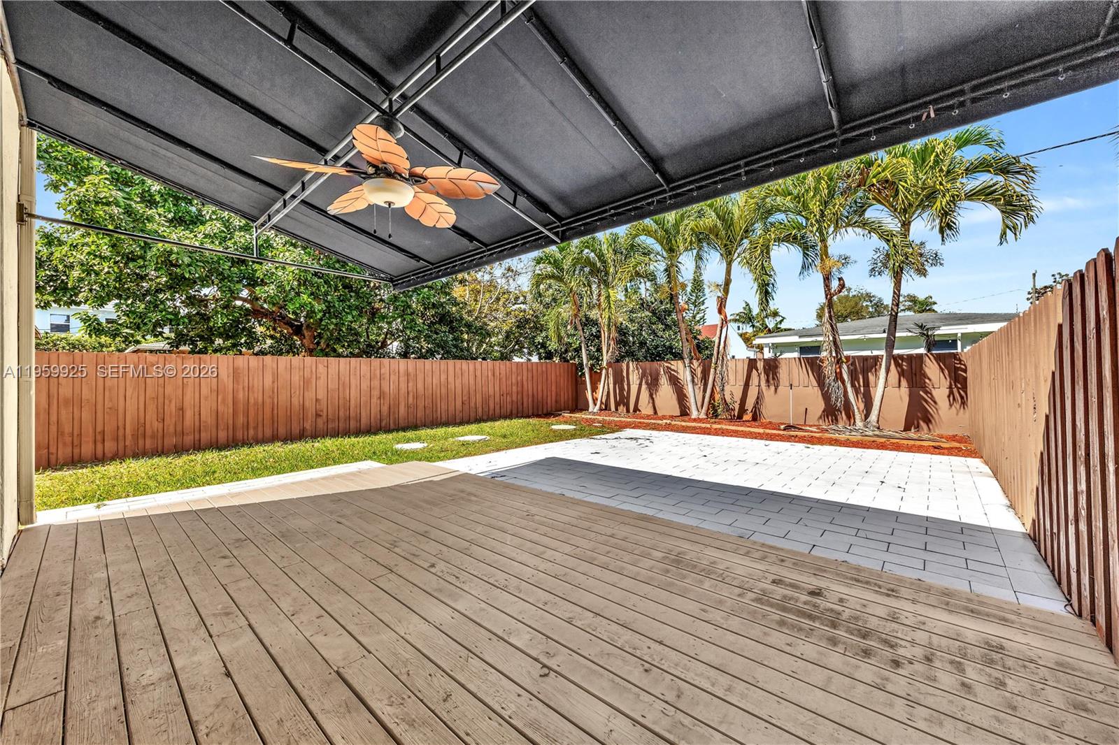 4025 Southwest 10th Street Miami, FL 33134 - Photo 18 of 41 a view of swimming pool with wooden fence