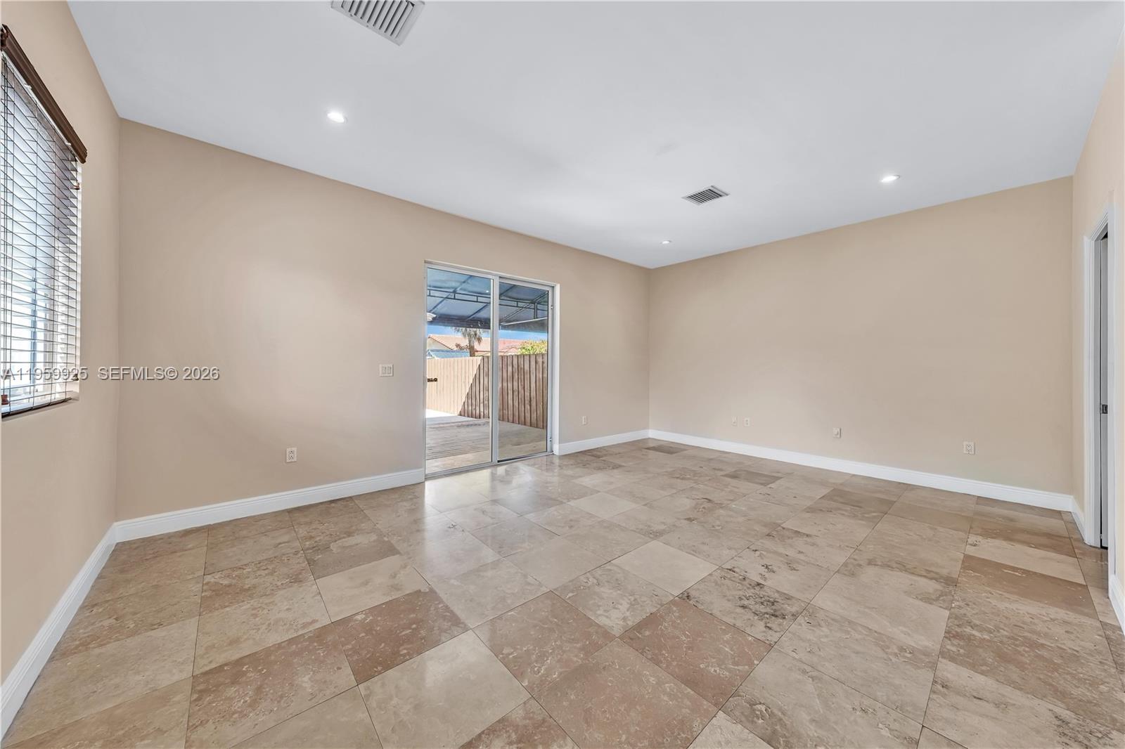 4025 Southwest 10th Street Miami, FL 33134 - Photo 19 of 41 en empty room with windows
