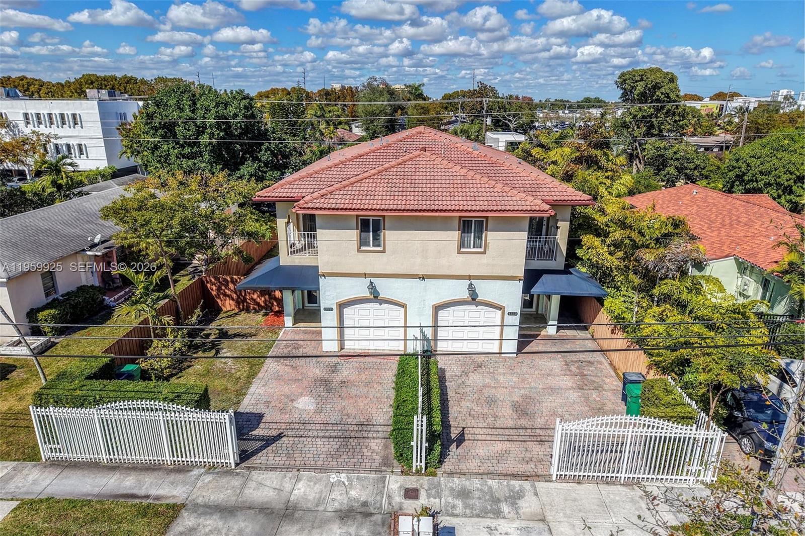 4025 Southwest 10th Street Miami, FL 33134 - Photo 2 of 41 a front view of a house with garden
