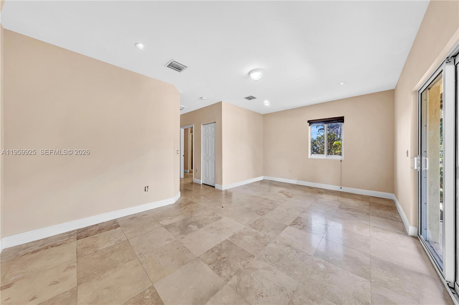 4025 Southwest 10th Street Miami, FL 33134 - Photo 35 of 41 a view of an empty room with a window
