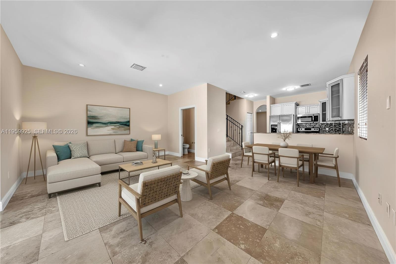 4025 Southwest 10th Street Miami, FL 33134 - Photo 9 of 41 a living room with furniture and a table