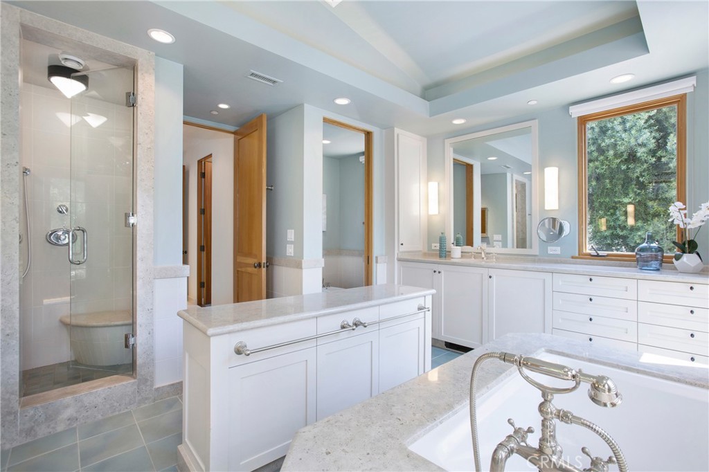 28100 Modjeska Canyon Road Silverado, CA 92676 - Photo 13 of 30 a large bathroom with a double vanity sink a large mirror and a shower
