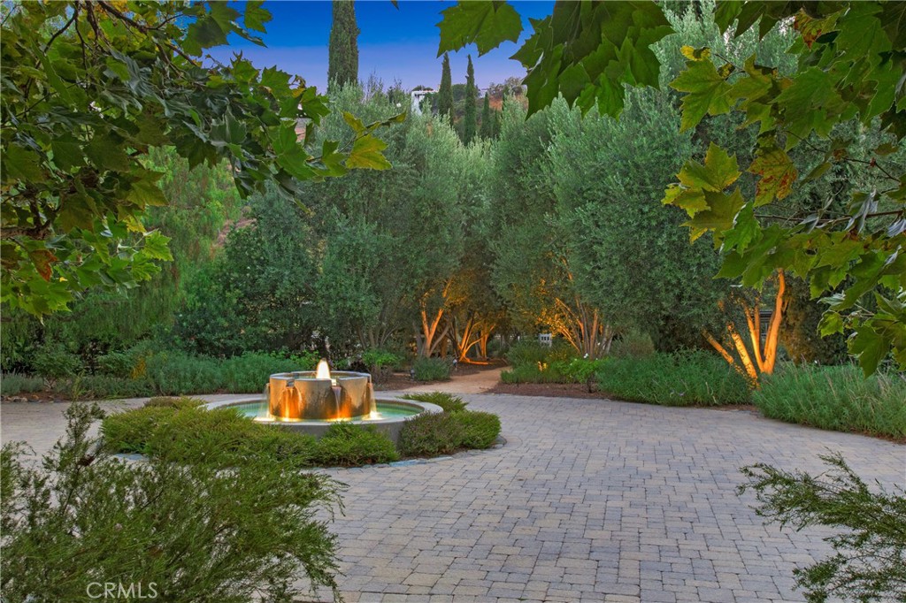 28100 Modjeska Canyon Road Silverado, CA 92676 - Photo 23 of 30 a backyard of a house with a yard and outdoor seating
