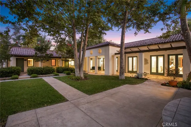 a backyard of a house with lots of green space