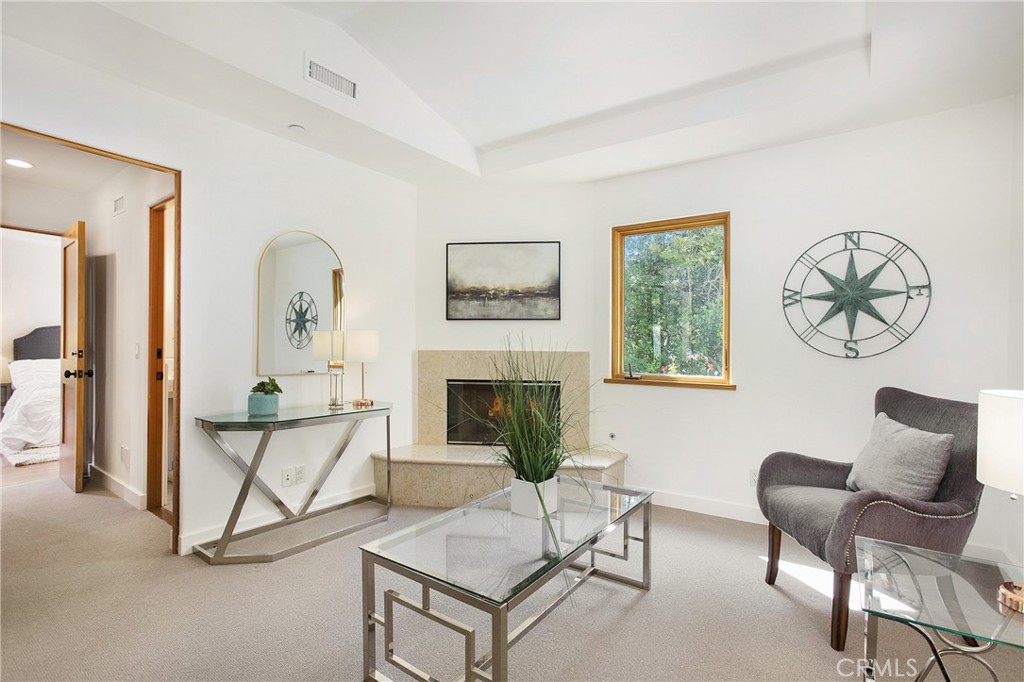 28100 Modjeska Canyon Road Silverado, CA 92676 - Photo 9 of 30 a living room with furniture a fireplace and a flat screen tv