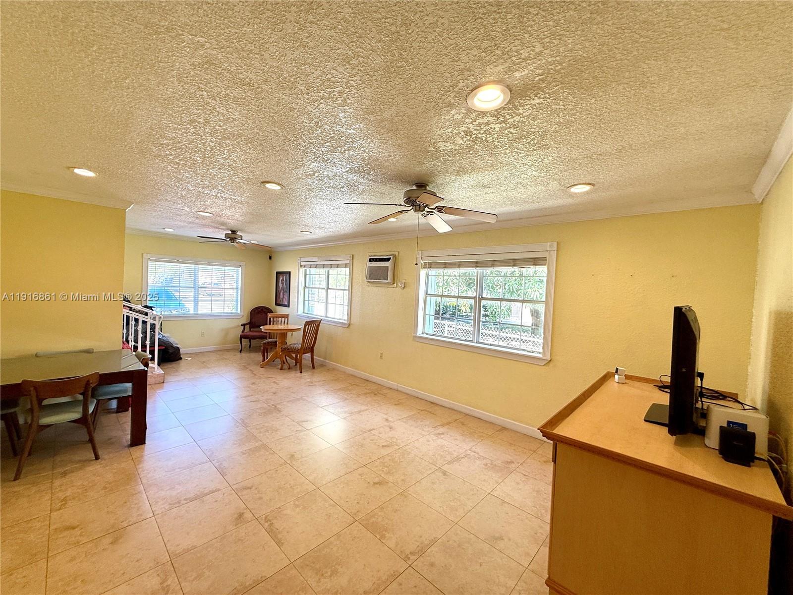 174 East 41st Street Hialeah, FL 33013 - Photo 13 of 46 a view of a living room and dining room