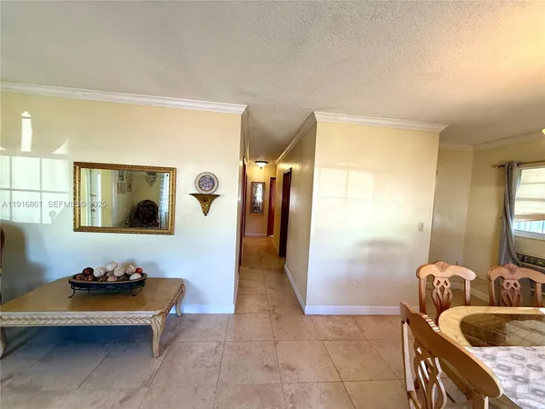 a bedroom with furniture and window