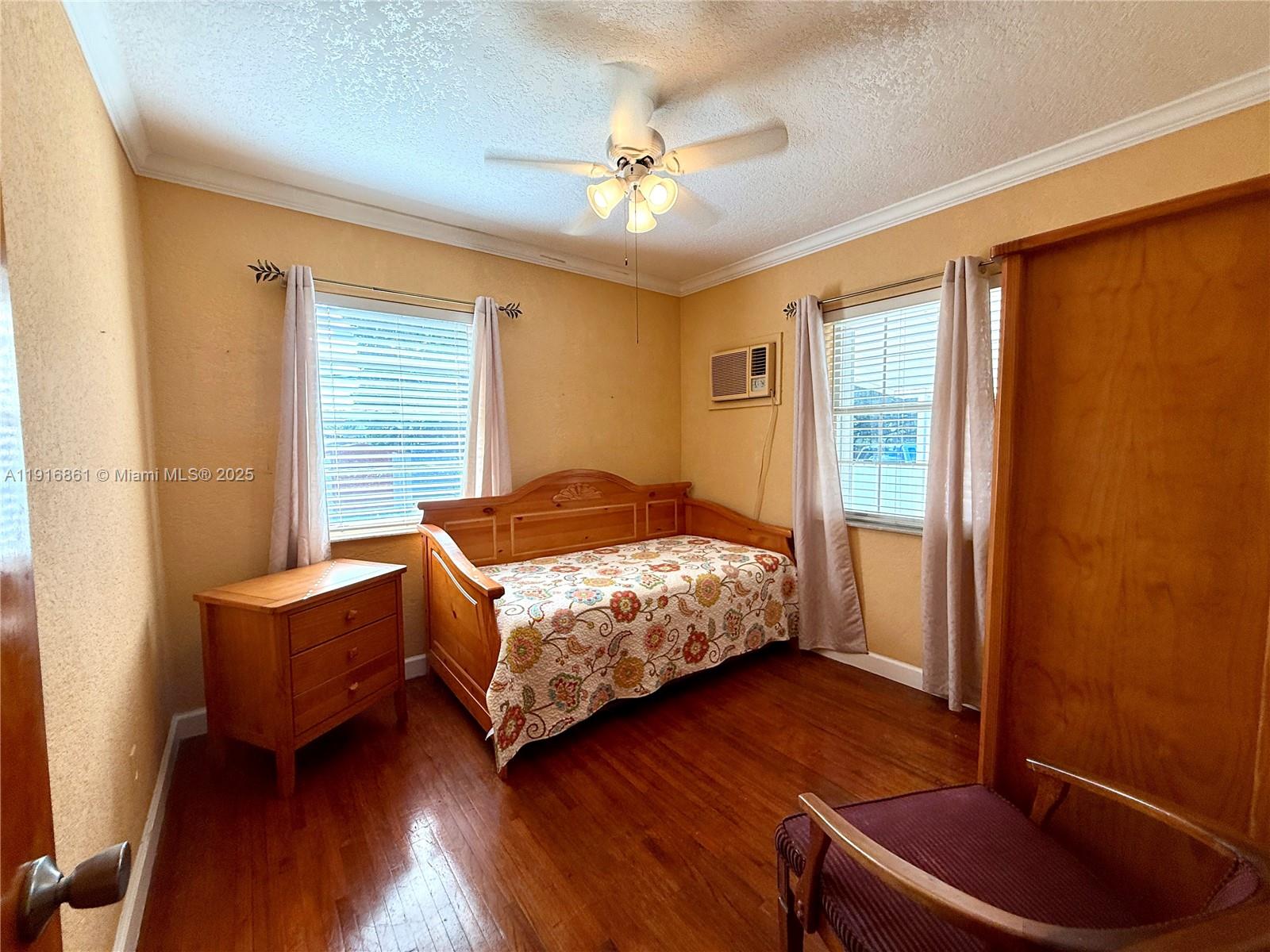 174 East 41st Street Hialeah, FL 33013 - Photo 46 of 46 a bedroom with bed and window