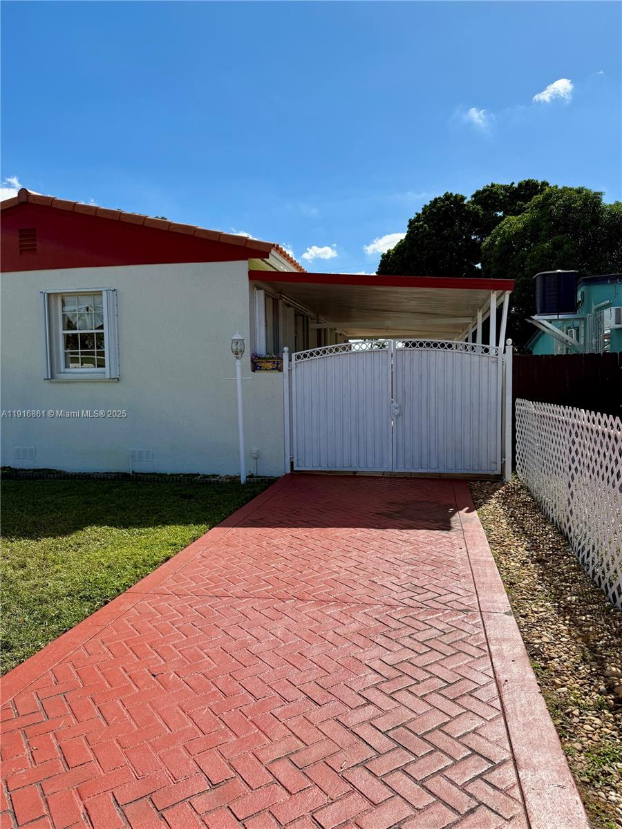 174 East 41st Street Hialeah, FL 33013 - Photo 5 of 46 a backyard of a house
