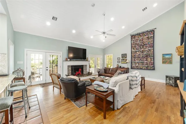 a bathroom with a sink mirror and a bathtub