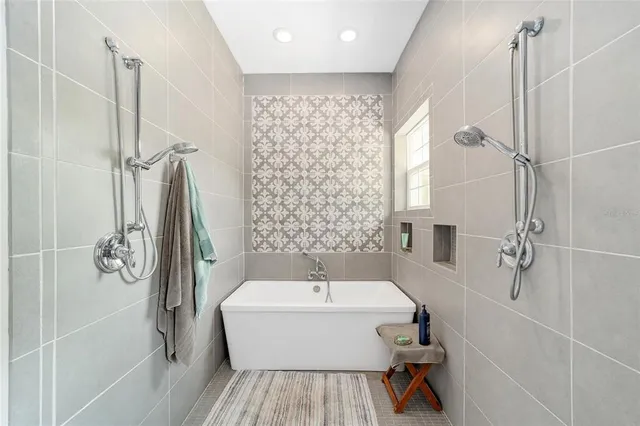 a view of a dining room with furniture and window