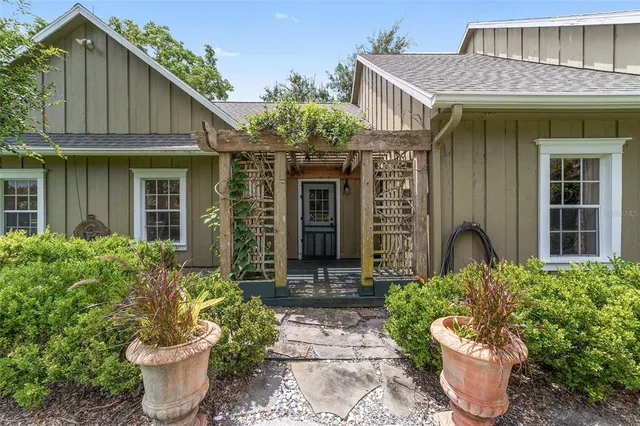 a backyard of a house with seating space