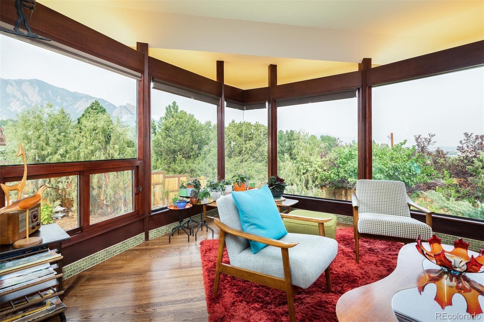 415 Drake Street Boulder, CO 80305 - Photo 12 of 40 a living room with furniture and a large window