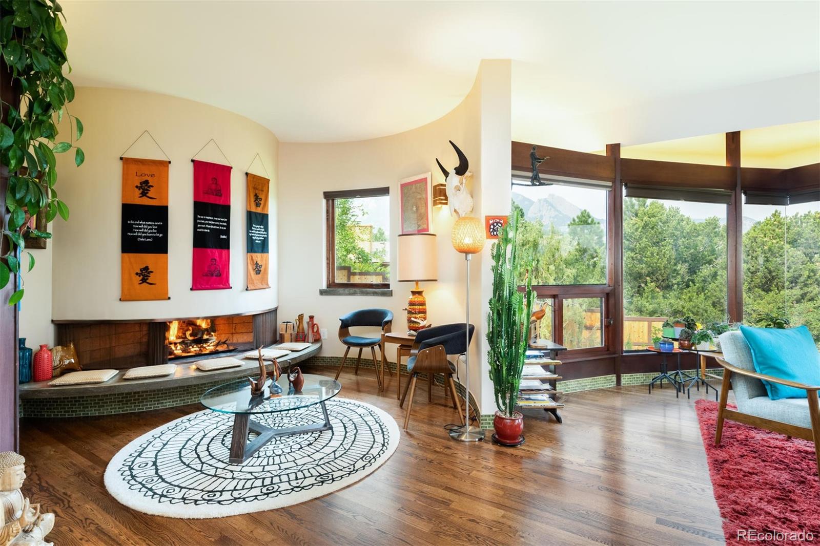 415 Drake Street Boulder, CO 80305 - Photo 13 of 40 a living room with furniture and a floor to ceiling window
