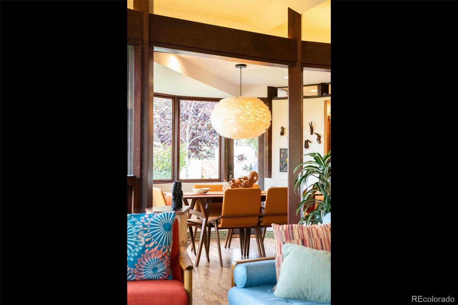415 Drake Street Boulder, CO 80305 - Photo 15 of 40 a view of a dining room with furniture and a large window
