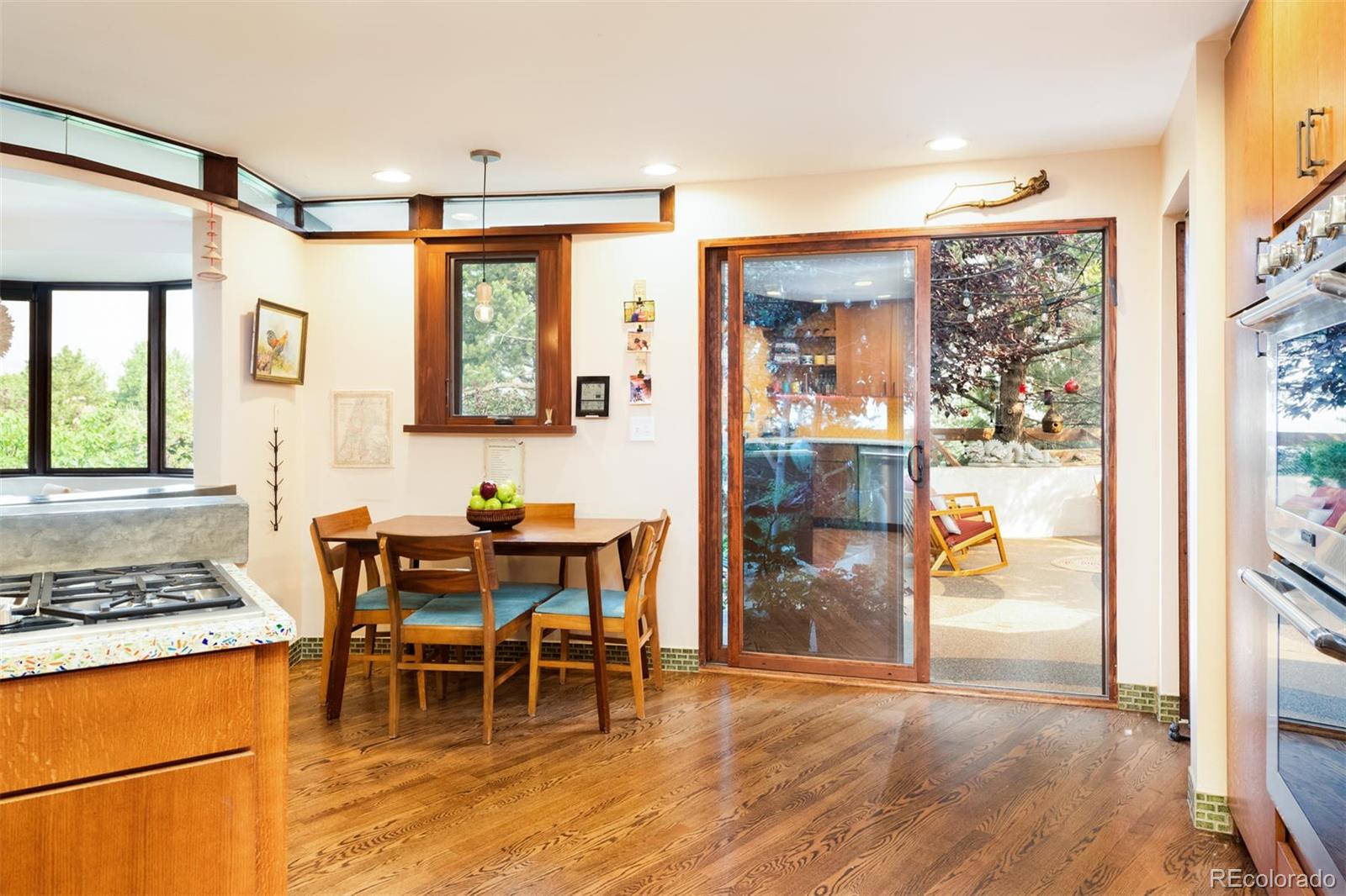 415 Drake Street Boulder, CO 80305 - Photo 21 of 40 a dining room with wooden floor and a window