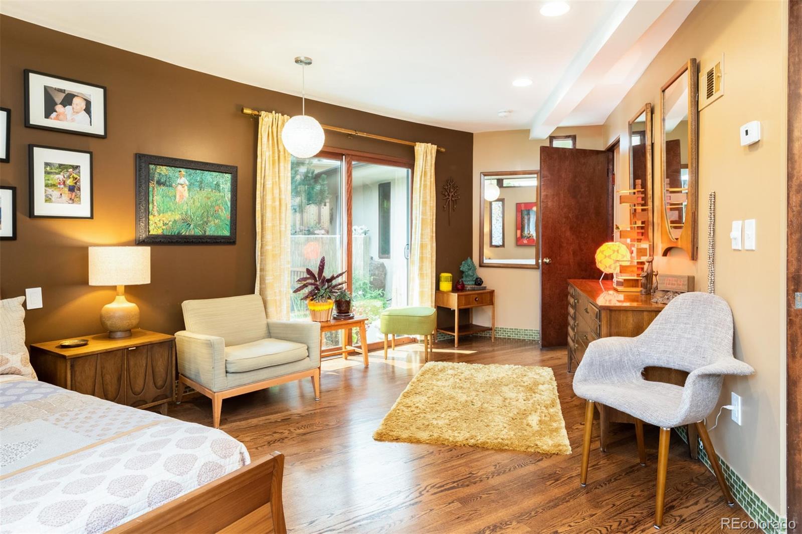 415 Drake Street Boulder, CO 80305 - Photo 24 of 40 a living room with furniture and wooden floor