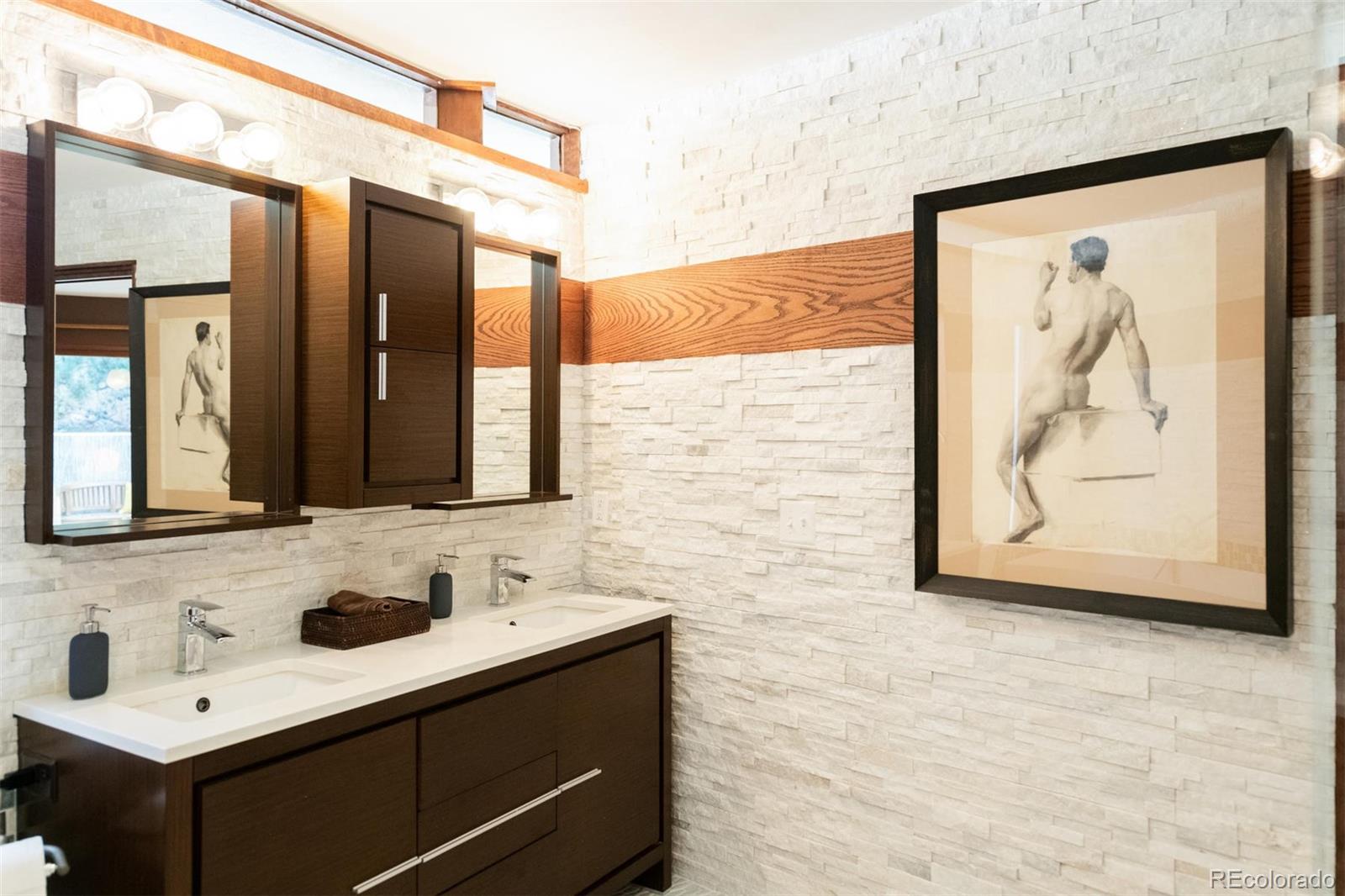 415 Drake Street Boulder, CO 80305 - Photo 27 of 40 a bathroom with a sink and a mirror