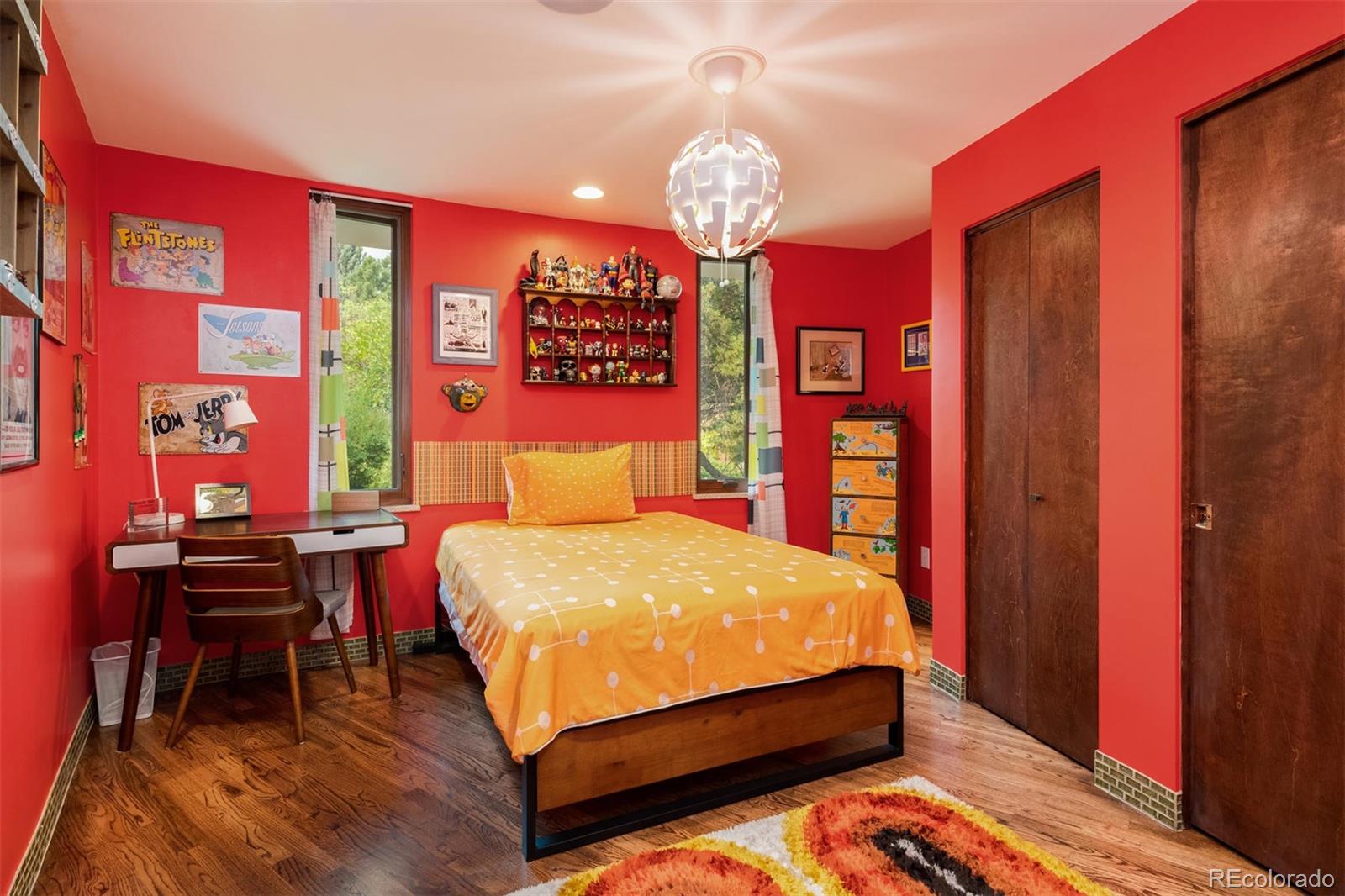 415 Drake Street Boulder, CO 80305 - Photo 28 of 40 a bed sitting in a bedroom next to a window