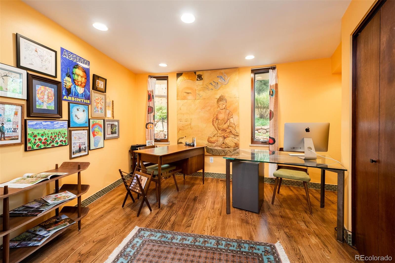 415 Drake Street Boulder, CO 80305 - Photo 31 of 40 a living room with furniture a flat screen tv and next to a window