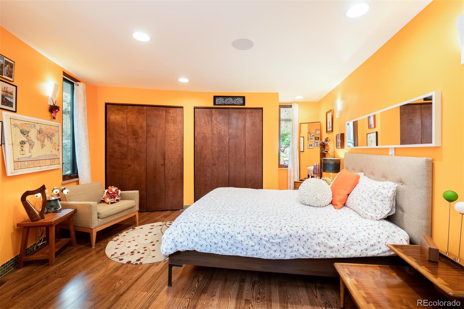 415 Drake Street Boulder, CO 80305 - Photo 33 of 40 a bedroom with a bed and wooden floor