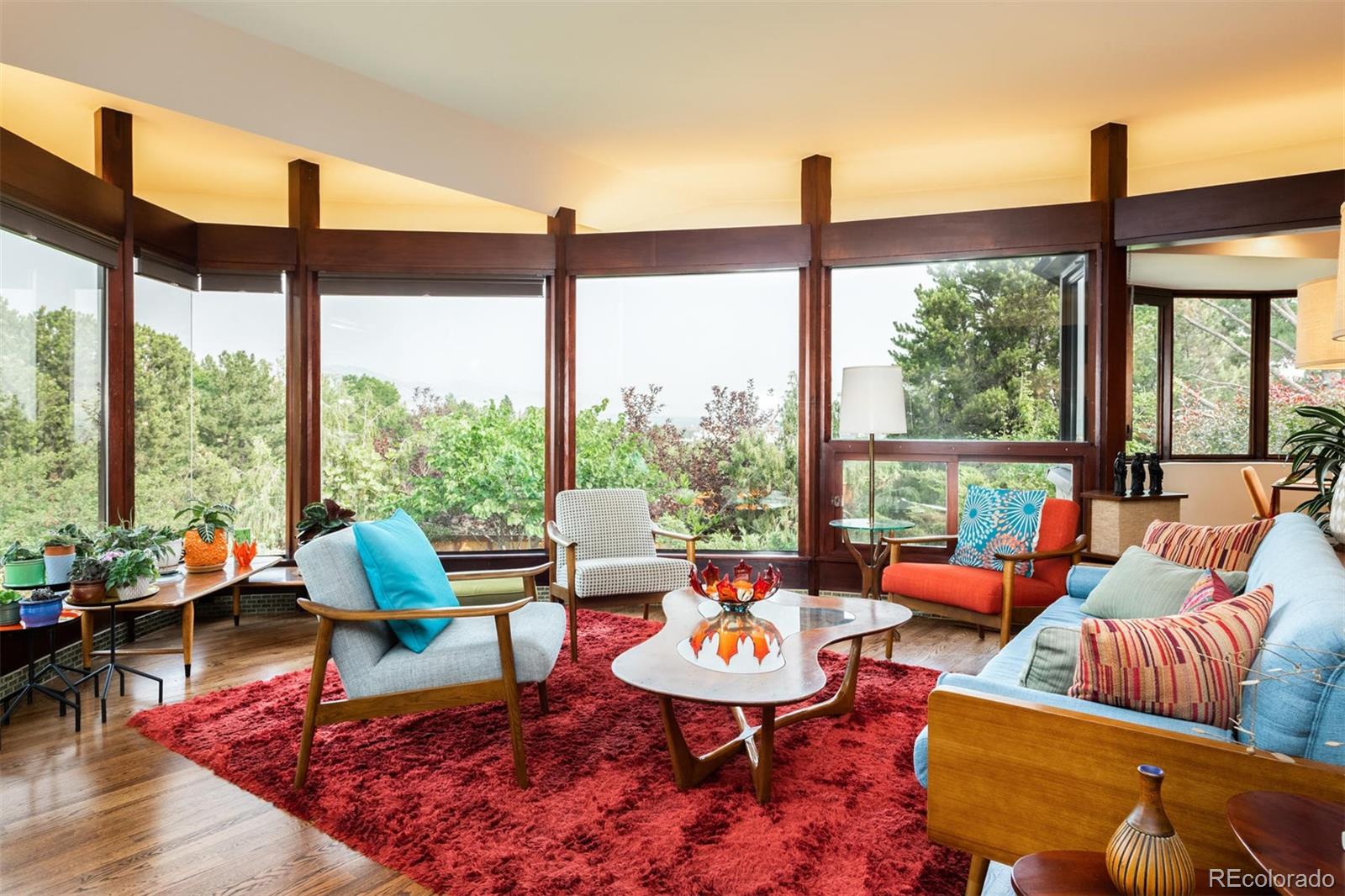 415 Drake Street Boulder, CO 80305 - Photo 8 of 40 a living room with furniture and a large window