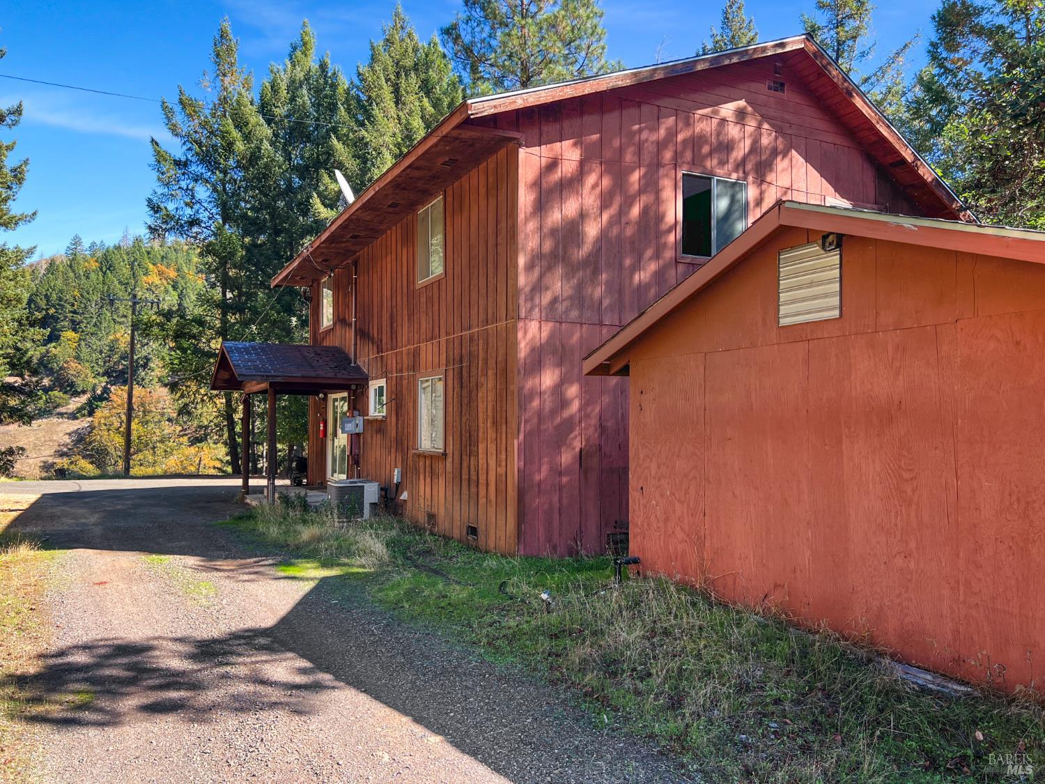 8555 Cave Creek Road Redwood Valley, CA 95470 - Photo 3 of 9 a backyard of a house with barbeque oven