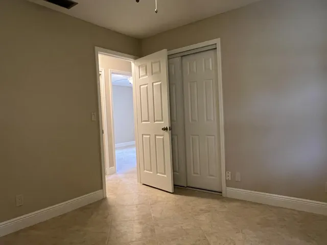 an empty room with window