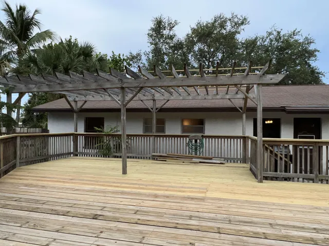 a view of a wooden roof deck