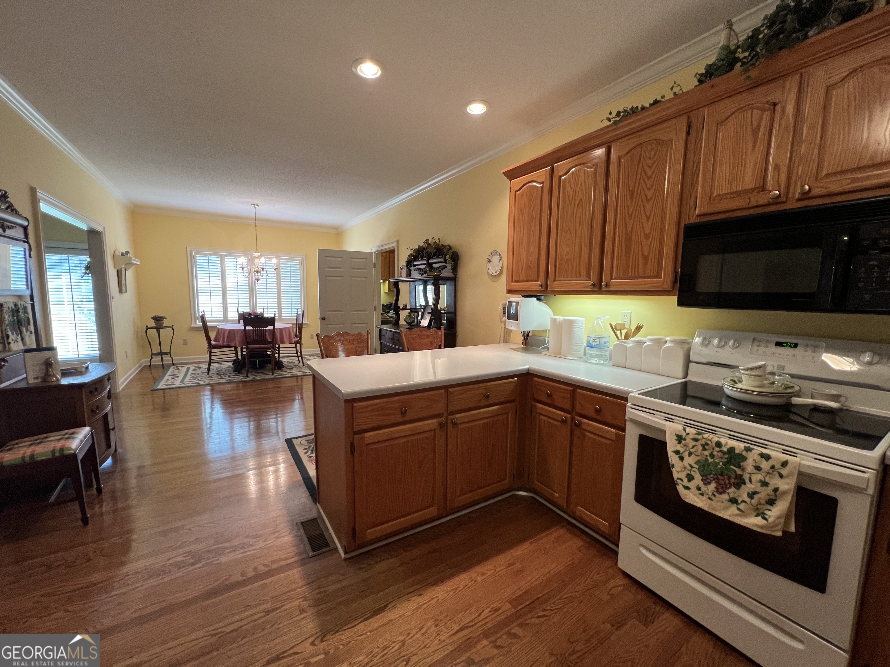 762 Nicholson-Carr Road Chester, GA 31012 - Photo 14 of 80 a kitchen with sink stove and cabinets