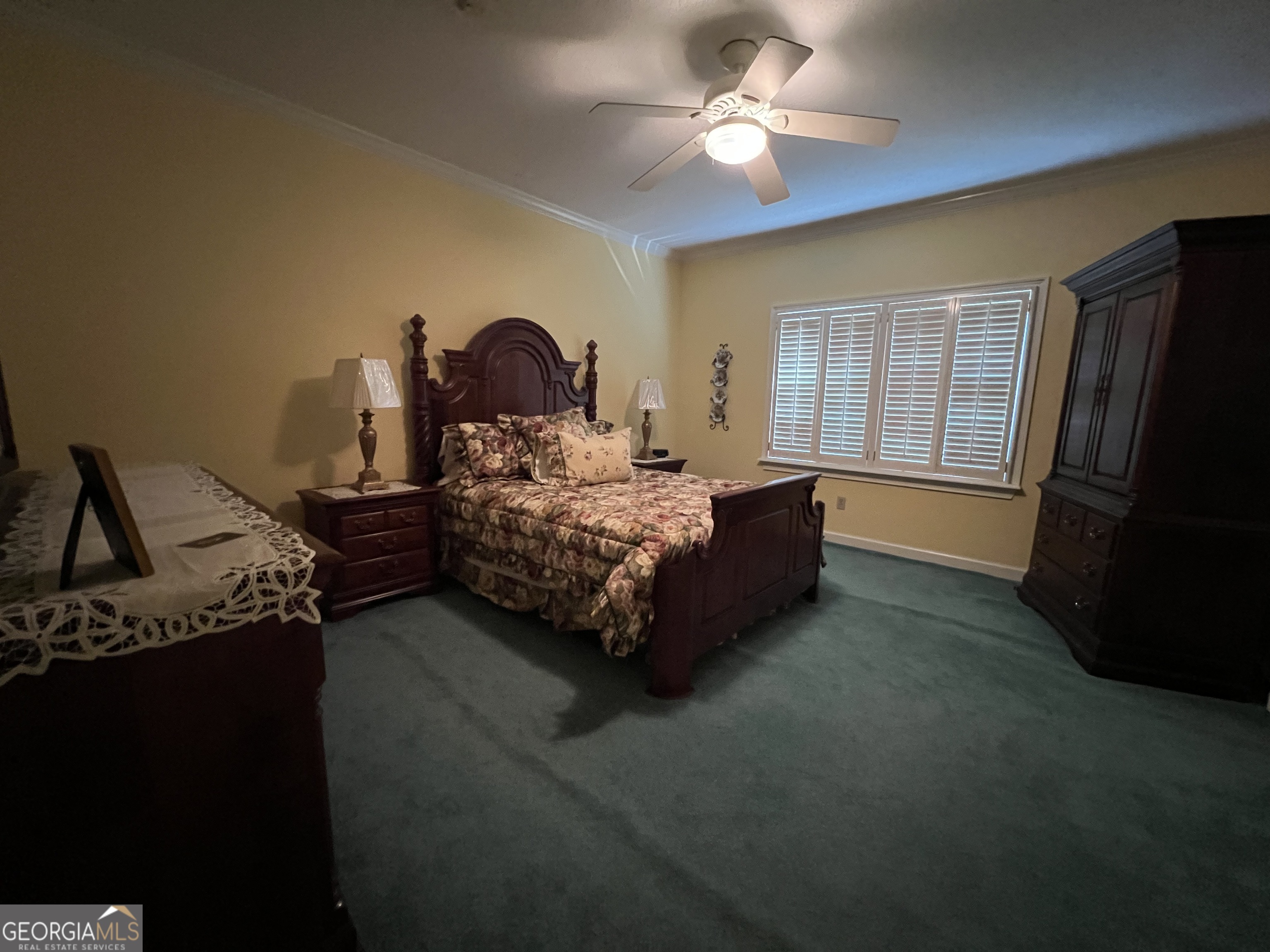 762 Nicholson-Carr Road Chester, GA 31012 - Photo 21 of 80 a bed room with a bed furniture and a flat tv screen