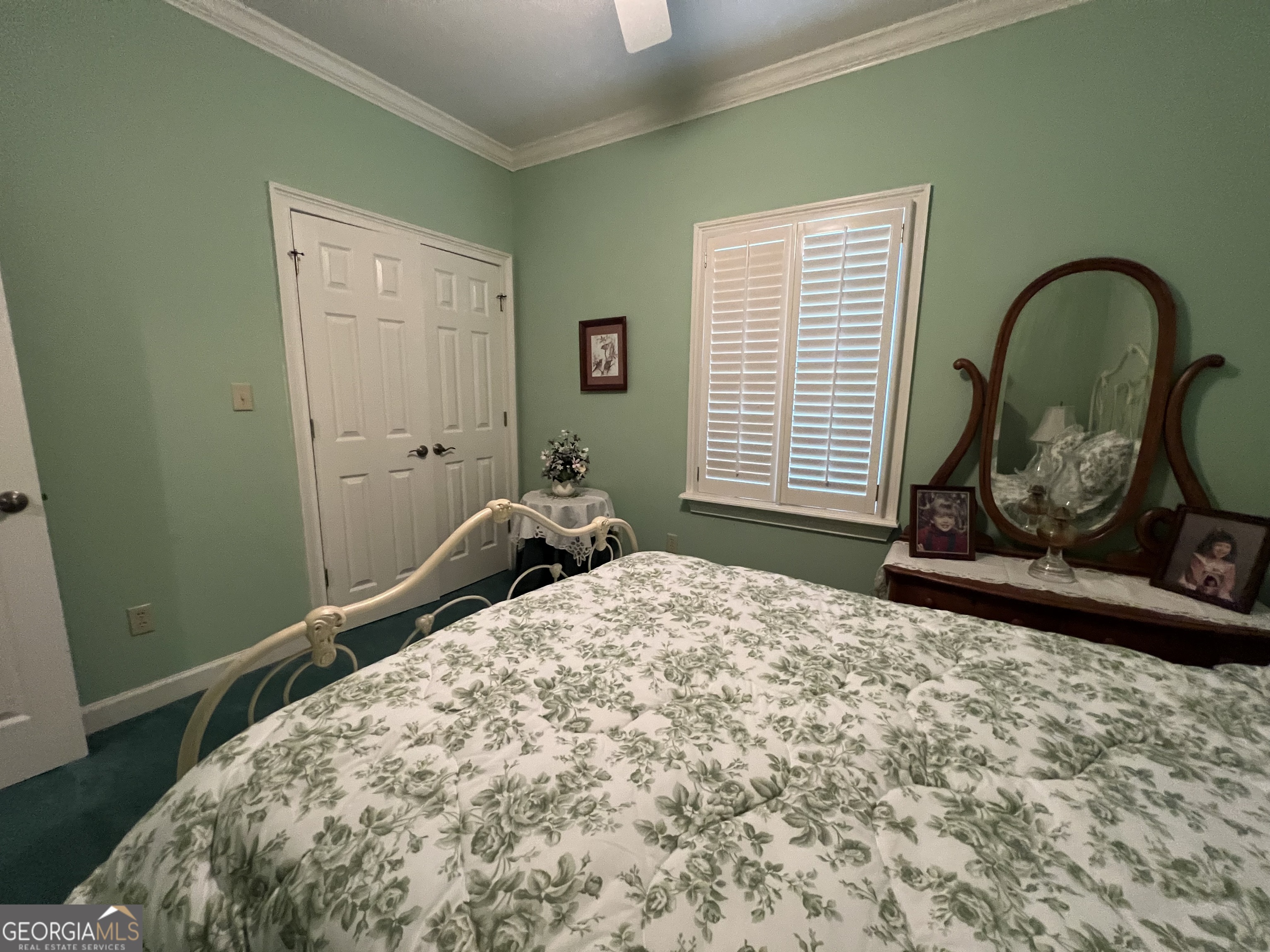 762 Nicholson-Carr Road Chester, GA 31012 - Photo 25 of 80 a bedroom with a bed and a dresser next to a window